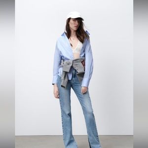 ZARA SLIM FLARED SLITTED HIGH RISE Z1975 JEANS
Mid-blue